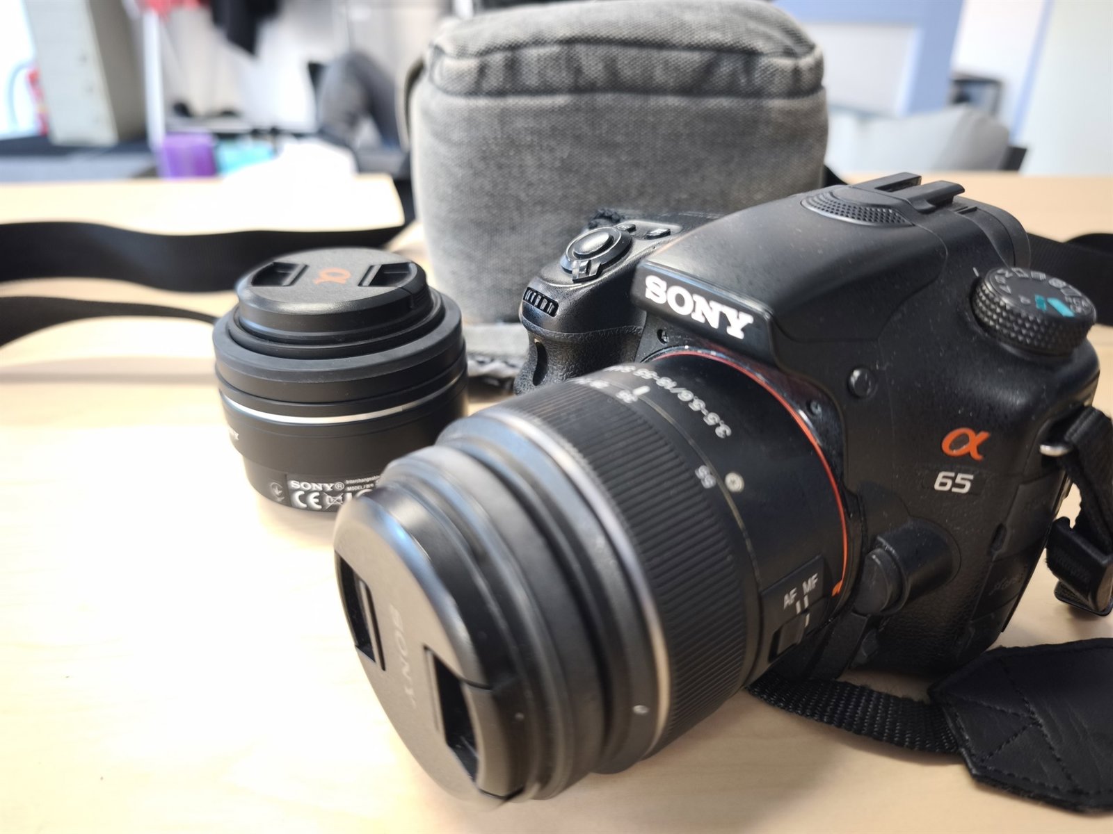 Sony Alpha A65 Camera with Two Lenses